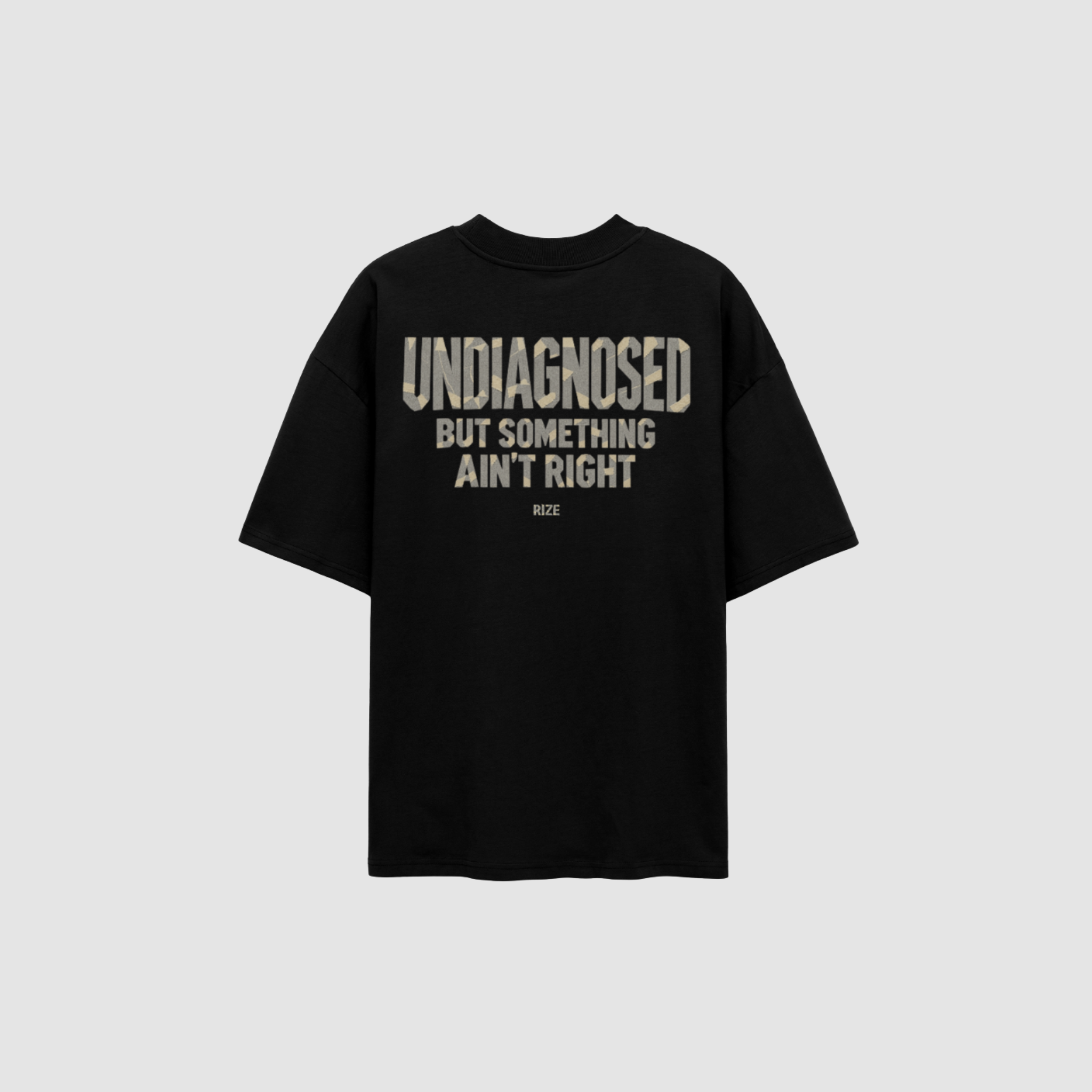 T-Shirt von RIZE mit Aufdruck: Undiagnosed, But Something Ain't Right